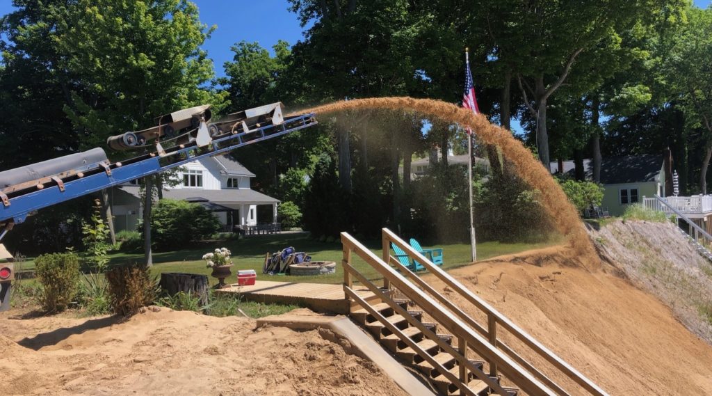 Beach sand delivery in michigan sand slinger